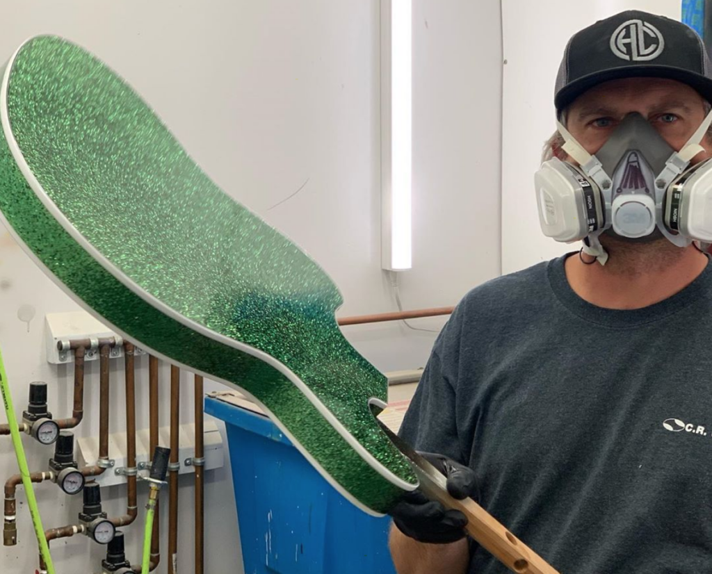 Tim in the spray booth with a green sparkle Volare